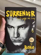 Autographed book new Bono U2