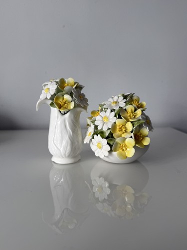 Pair floral royal doulton - of,