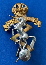 R.E.M.E army split pin badge brass & white metal