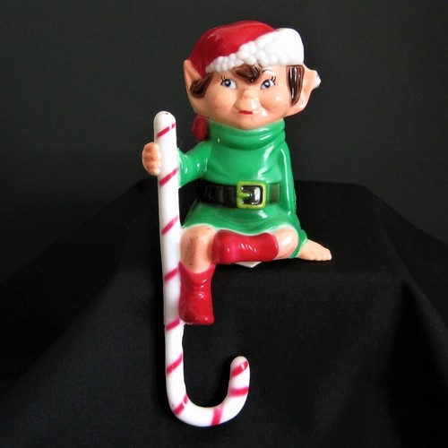 Sitting elf with candy - sitting,