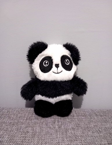 Small fluffy black and - fluffy, white