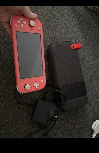 Nintendo switch lite coral - nintendo,