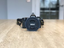 Nikon F80 plus 28 - 100mm lens