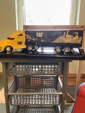 CAT caterpillar lorry truck. light up lights but no sound swings and drives