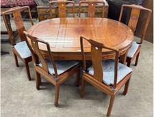 A Chinese hardwood oval dining table and six chairs In Good Condition