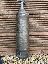 Vintage brass pyrene fire