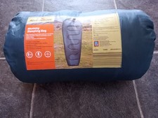 Brand New Mummy Sleeping Bag In A Dark Blue With Protective Transportation Bag.