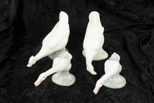 A Collection of 4 Lladro Nao