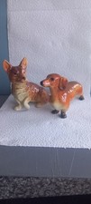 2 West German  Dog Figures