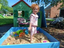 Wooden sand pit with lid
