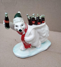 Pottery Coca-Cola polar bear with santa sack full of Coca-Cola bottles