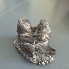 the wolf sculptures canada Inuit Carving Of 2 Eskimos In Kayaks