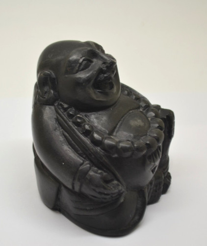 Buddha laughing happy seated