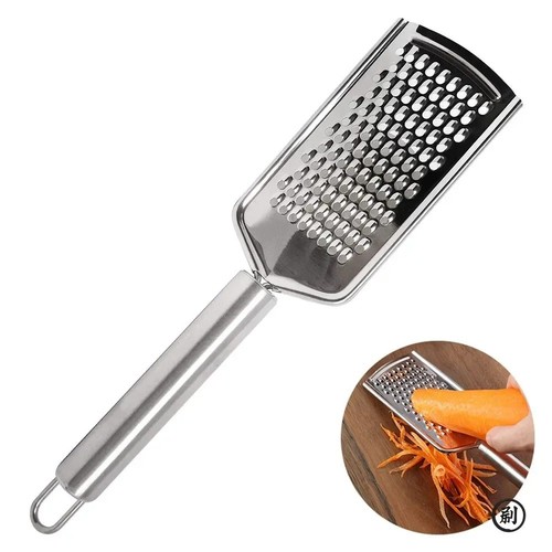 Hand held cheese grater - hand,