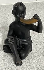 SMALL VINTAGE SEATED AFRICAN TRIBAL BLACK BOY FIGURINE BLOWING GOLD HORN