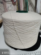 Natural Wool yarn on cone, sutible for machine or hand knitting. Over 1500g.