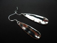 A PAIR OF TIBETAN SILVER
