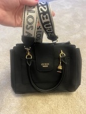 Guess Black Handbag with Gold Charms andRemovable Strap