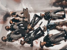 Ten vintage lead toy cowboys