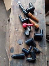 Collection of vintage spark plug caps/boots inc Champion brand