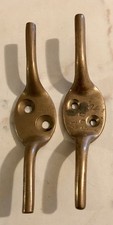 TWO SOLID BRASS BLIND CLEATS -