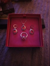 Ring, Earrings And Necklace Set In Sterling Silver. Lab Grown Rubies And Zircons