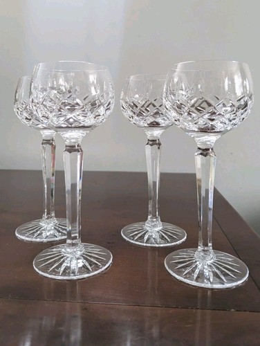Four tall stemmed crystal hock - four,