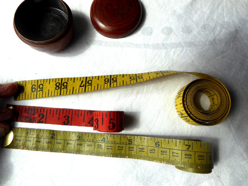 Three vintage tape measures - three,