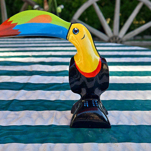 Hand painted wooden toucan - hand,