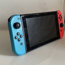 NINTENDO SWITCH V1 handheld console with Neon Red Blue Joycons