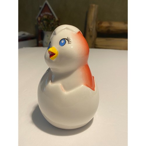 Ceramic chick hatching from - chick,