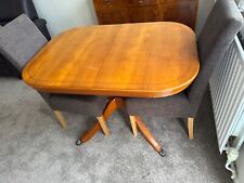 dining table and matching chairs and side board