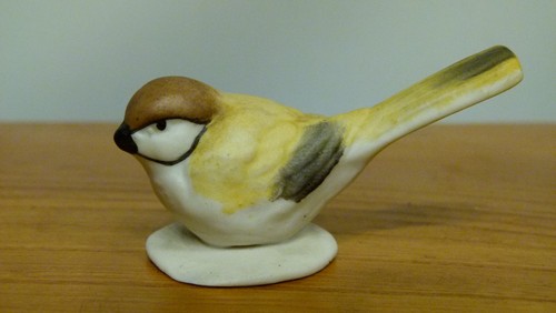 Small bisque porcelain bird