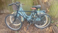 two adult bicycles male and