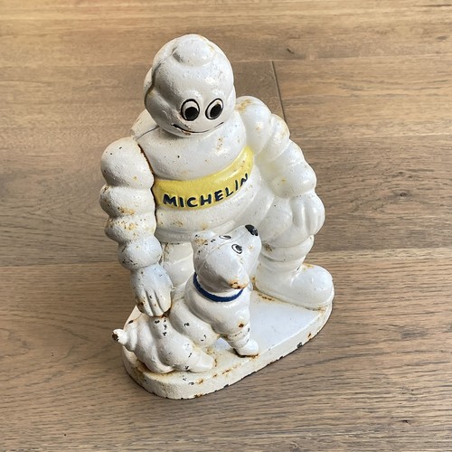Cast iron michelin man with - iron,