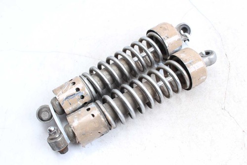 Rear shock absorber strut