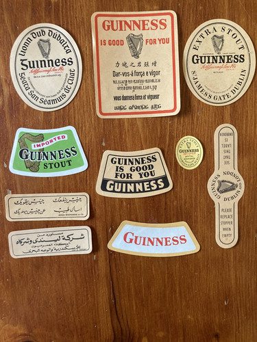 Ten various guinness labels - various,