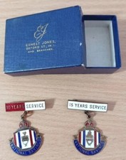 Two long-service enamel