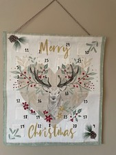 Handmade Fabric Christmas Advent Calendar with a Reindeer theme.