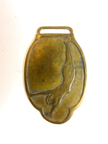 Old pressed metal woman diver - pressed,