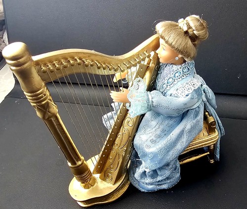 Artisan lady playing - playing, golden