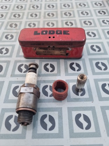 Lodge spark plugs in - 14,