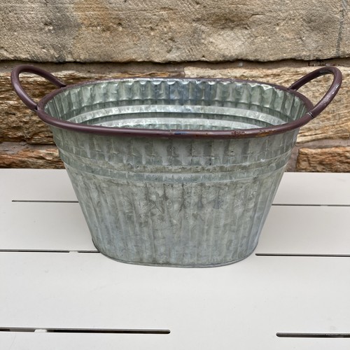 Ribbed oval metal planter - planter, with