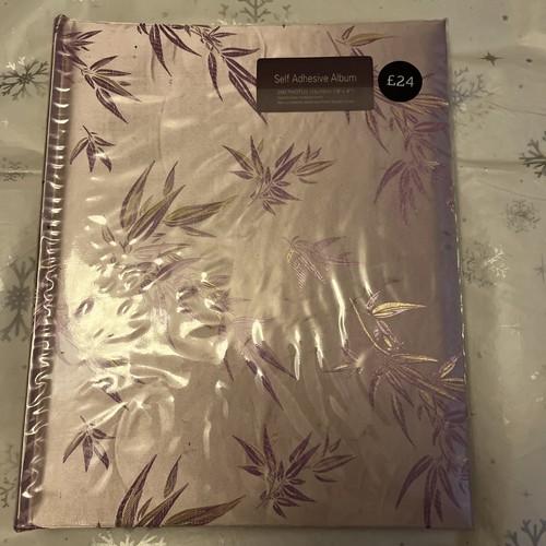 Self adhesive photo album - self,