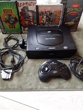 sega saturn console and 4