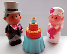 ELC Happyland people      Bride and Groom with wedding cake  