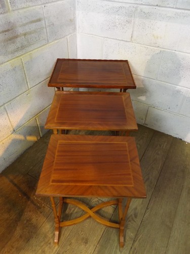 Mahogany veneer nest - of, 3