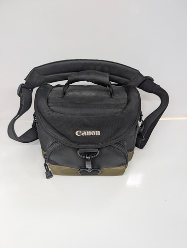 Canon 100eg camera lens gadget - canon,