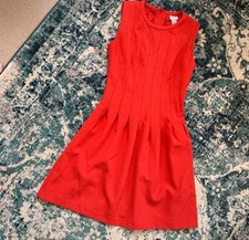 Red Knee Length Pleated Dress