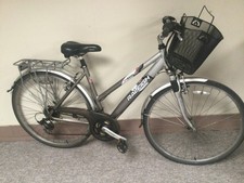 Woman’s Raleigh country bike, shopping, leisure, has basket, paneers,